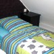 One of the single beds in the loft room